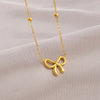 Golden Grace Infinity Bow Pendant - Waterproof and Anti-Tarnish